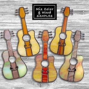 May include: Five stained glass guitar ornaments in various colors and wood grain patterns. The ornaments are arranged in a row on a wood background. The text "Mix Color & Wood Samples" is displayed above the ornaments.