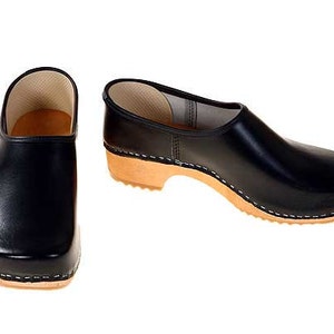 Closed Clog black with bright sole image 1