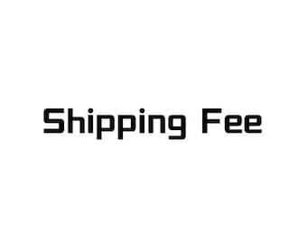 May include: The text Shipping Fee is displayed in a bold, black, sans-serif font against a plain white background. The letters are evenly spaced and clearly legible, presenting the words in a straightforward, minimalist typographic style.