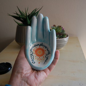 Ceramic hand has the message Carry your sunshine with you. Hand-painted with underglazes and ready to display on a table or wall. image 3