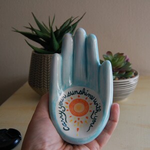 Ceramic hand has the message Carry your sunshine with you. Hand-painted with underglazes and ready to display on a table or wall. image 4