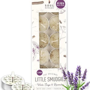 May include: A box of 12 "Little Smudgies" tea light candles with "White Sage & Lavender" scent. The box has a window showing the candles, and the text "SOUL STICKS" and "4 Hrs Burn Time". A sprig of lavender is next to the box.