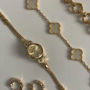 Vintage Style Gold Watch with Elegant Detailing for her