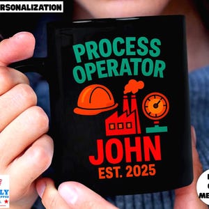 May include: Black ceramic mug with the words "PROCESS OPERATOR" in green, "JOHN" in red, and "EST. 2025" in red. The mug features an orange hard hat, a factory illustration, and a gauge. The mug is held by a person.