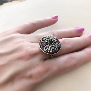 Art Deco jeweled ring! Stunning rich colored  gemstones in this beautiful circular ring