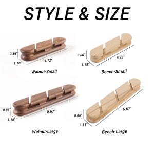 May include: Wooden cable organizers in walnut and beech wood, available in small (4.72" long) and large (6.67" long) sizes. The image shows the dimensions of each organizer, with a height of 1.18" and a width of 0.86". The text "STYLE & SIZE" is at the top.