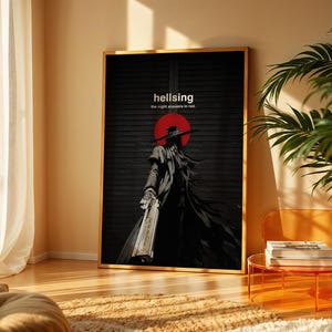 May include: A rectangular wall art print in a gold frame featuring a dark illustration of a figure in a long coat and wide-brimmed hat holding a large handgun. The text "hellsing" and "the night answers in red" appears above a solid red circle.