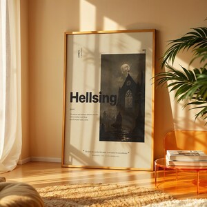 May include: A rectangular wall art print in a thin gold frame featuring the word Hellsing in bold black text, a dark gothic illustration of a church under a full moon, and small printed text details on a light beige background.