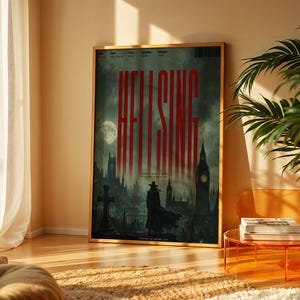 May include: A rectangular poster in a thin gold frame featuring a dark, atmospheric scene with a silhouette of a figure in a long coat and hat standing before a gothic cityscape, with the red text HELLSING prominently displayed at the top center.