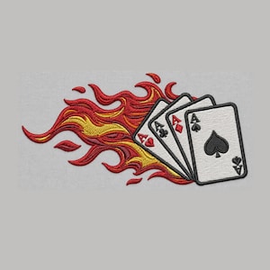 May include: An embroidered patch featuring three playing cards fanned out, each displaying an ace. The cards are engulfed in stylized flames rendered in vibrant shades of red, orange, and yellow, creating a dynamic visual effect against the fabric.