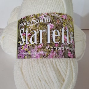 May include: A skein of white yarn labeled "Mary Maxim Starlette Worsted Weight 100% Acrylic/Acrylique/Acrilico"