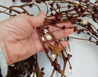Burgundy and Cream Mixed Berry Strands with Rusty Tin Stars, 6ft, 7ft, 9ft, and 10ft,  in length.
