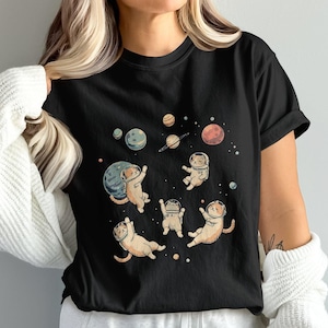 Linda camiseta de gatos astronautas en el espacio, camiseta con diseño de gatitos de dibujos animados flotando entre planetas, divertida camiseta de regalo para amantes de los gatos cósmicos