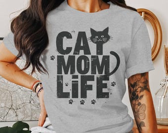 May include: Gray t-shirt with a black cat silhouette and the text "Cat Mom Life" in black with paw prints.