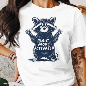 Funny Cute Raccoon Panic Mode Activated T-Shirt, Humorous Animal Graphic Tee, Cute and Funny Raccoon Shirt for Animal Lovers