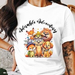 Adorable camiseta de aventuras, linda camiseta con gráficos de amigos animales, diseño divertido y caprichoso para todas las edades, camiseta infantil de animales de dibujos animados.