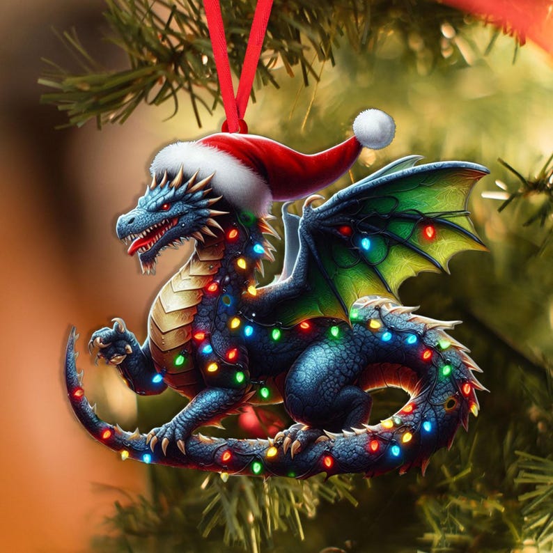 May include: A blue dragon Christmas ornament with a Santa hat and colorful string lights. The dragon has green wings and a red ribbon for hanging. The ornament is hanging on a Christmas tree.