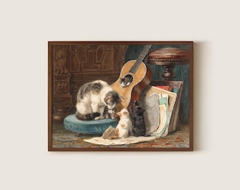 May include: A framed vintage print depicts a domestic scene with several cats and a guitar. A calico cat sits on a blue cushion, while other cats gather around. A guitar leans against a stack of papers, adding to the cozy atmosphere.