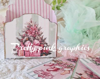 Puede incluir: Una caja a rayas rosa y verde con un diseño de árbol de Navidad y regalos. La caja está decorada con un lazo rosa y el texto "Pretty Pink Graphics".