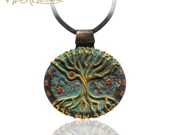 Unique pendant necklace, decorated with gold tree of Life, looks like ancient jewelry patinated and aged.