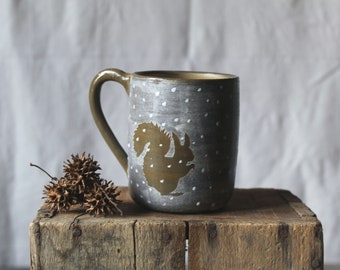 Stoneware Tea Cup  "The squirrel in the snow" -