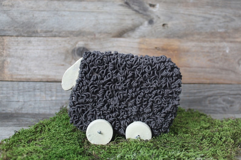 Black Ceramic Sheep on Wheels for Your Home Home Decor image 1