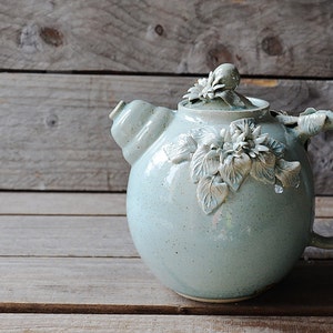 Daisy Teapot -  Stoneware teapot with daisies in light blue granitic glaze