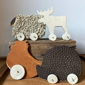 Black Ceramic Sheep on Wheels for Your Home Home Decor image 2