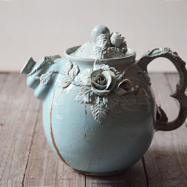 Alice in Wonderland Teapot  - Stoneware teapot with roses in light blue granitic glaze