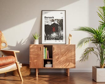 May include: A framed "Berserk" poster with black and white artwork and red accents, displayed on a wooden cabinet. The cabinet has a mid-century modern design with a small plant and a wooden hand sculpture on top. A potted plant is on the right.