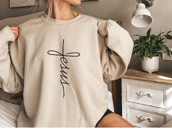 Bluza z krzyżem Jezusa: minimalistyczny chrześcijański sweter