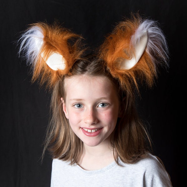 Large fox ears with white tips, clip in or headband.