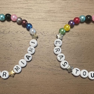 Eras Tour Miami friendship bracelet with gold or silver stars. Each bead represents an era!