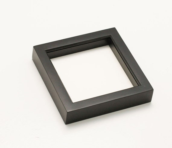 Glass shadow outlet box display case