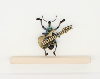 Real Beetle Playing Electric Guitar Insect Art Taxidermy 6x8