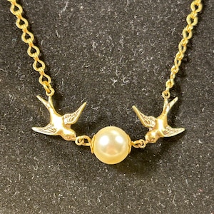 Little Brass Birds in Flight with a Big Pearl Egg One of a Kind……