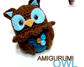 May include: A brown crocheted amigurumi owl with blue felt eyes and a blue crocheted belly. The owl has brown buttons on its belly.