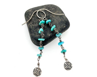 long turquoise and sterling silver dangle charm earrings by peaces of indigo