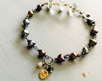 peacock pearl and quartz . sterling and 22k gold charm bracelet . handmade by peacesofindigo