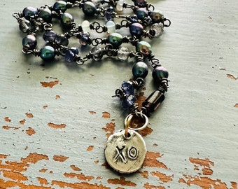 Baroque peacock pearl and iolite necklace with sterling silver xo charm by peacesofindigo