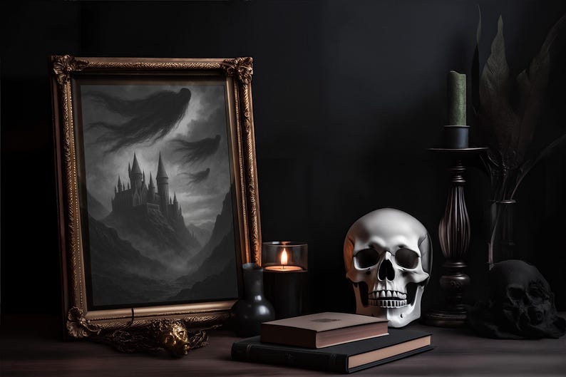 May include: A dark, gothic still life featuring a framed painting of a castle, a silver skull, candles, and books. The painting has a gold frame. The scene is moody, with a focus on Halloween decor.