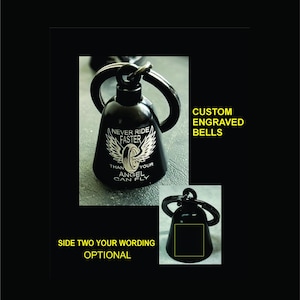 May include: Black motorcycle bell with a keyring, featuring the text "NEVER RIDE FASTER THAN YOUR ANGEL CAN FLY" and a tire with wings design. The image also includes the text "CUSTOM ENGRAVED BELLS" and "SIDE TWO YOUR WORDING OPTIONAL".