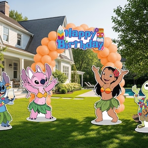 May include: Outdoor birthday decorations featuring cartoon characters, including Stitch, Angel, Lilo, and an alien, with a balloon arch that reads "Happy Birthday". The characters are in Hawaiian-themed outfits, standing on a green lawn.