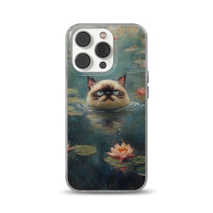 May include: A clear phone case with a humorous illustration of a grumpy cat in a pond, surrounded by lily pads and pink water lilies. The artwork is in a painterly style with blue and green tones.