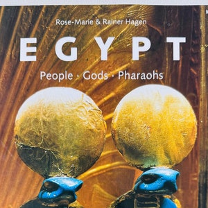 Egypt: People. Gods, Pharaohs Hardcover by Rose-Marie & Rainer Hagen, released in 1999