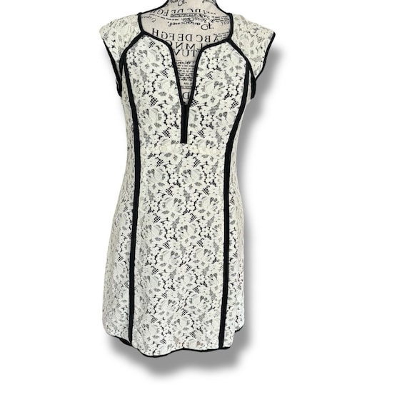 oh polly black lace up dress Scoop Neck Lace-up Back Mini Dress in Black - 6 main image 1