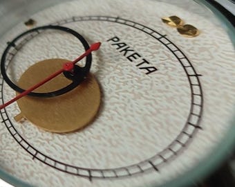 Rare montre mécanique Raketa Copernik - montre-bracelet pour homme vintage lune et soleil de l'URSS