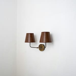 Aged Brass Finish and Leather Lampshade Sconce