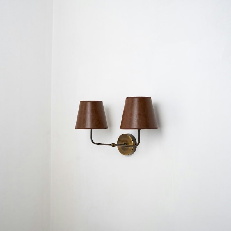 Aged Brass Finish and Leather Lampshade Sconce