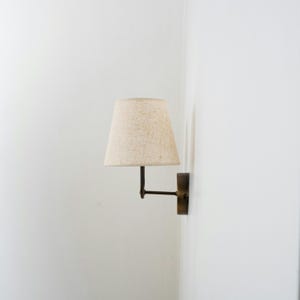 Aged Brass Finish and Stone Lampshade Sconce